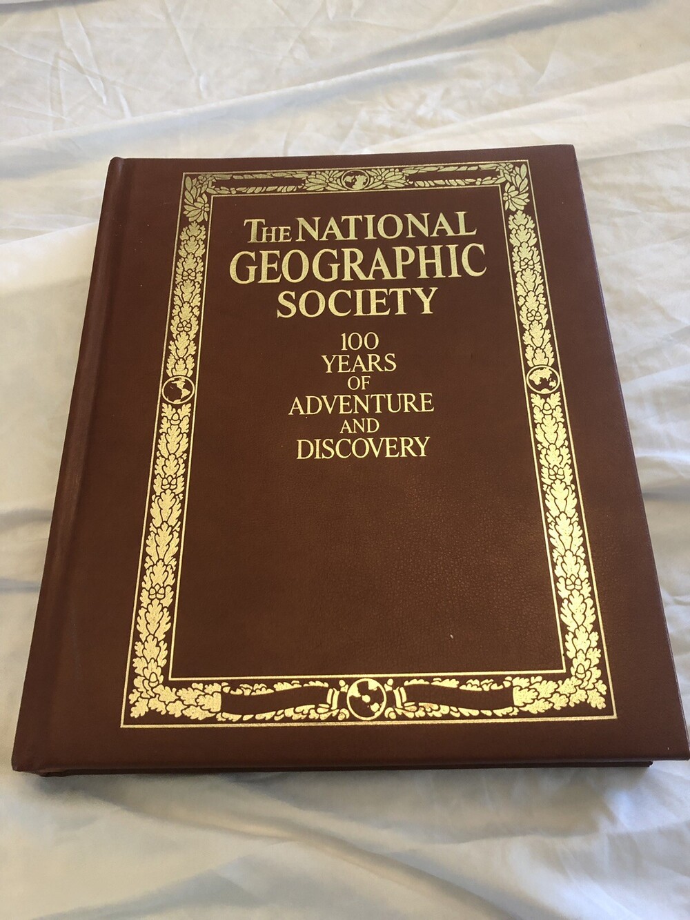 THE NATIONAL GEOGRAPHIC SOCIETY 100 YEARS OF ADVENTURE AND DISCOVERY Leather